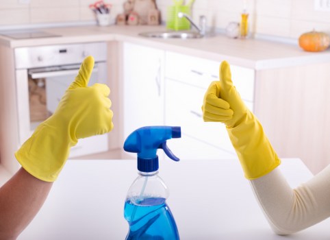 Cleaning team maintaining desks and common areas in a Chelsea office